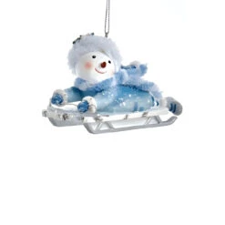 Kurt Adler Laying Blue Snowman Sledding Ornament